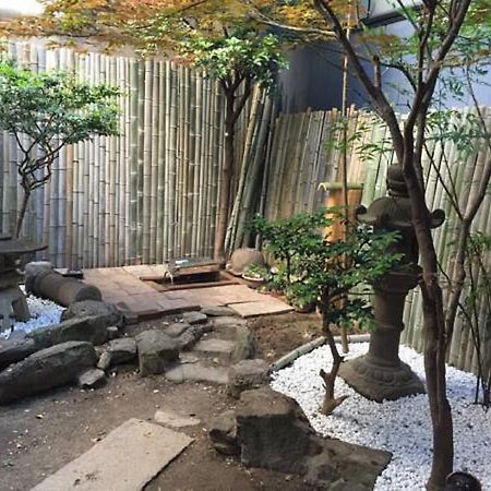 Gomaharu Guesthouse โอซาก้า ภายนอก รูปภาพ