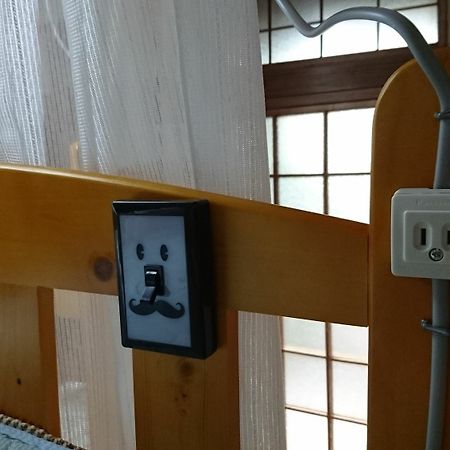 Gomaharu Guesthouse โอซาก้า ภายนอก รูปภาพ