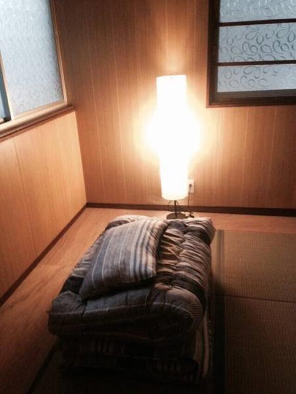 Gomaharu Guesthouse โอซาก้า ภายนอก รูปภาพ